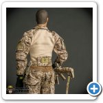 Cal Tek got all the technical details of the complex Crye uniform. The pouch on the belt back is the LBT quick release "blowout" med pouch. Many guys like to keep them on person at all times. The pouch allows for a quick release with a cable pull.